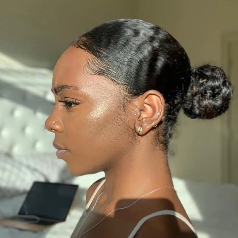 Sleek ponytail with gel styling