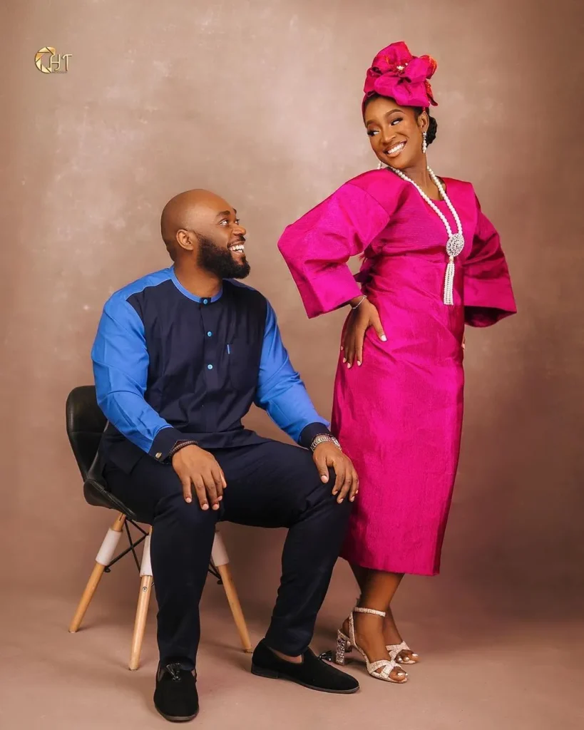 Pink asooke for bride with blue and black kaftan for groom