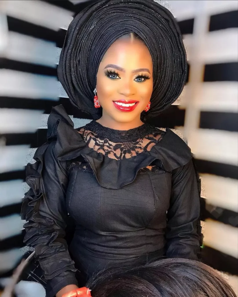 Woman black idoma attire