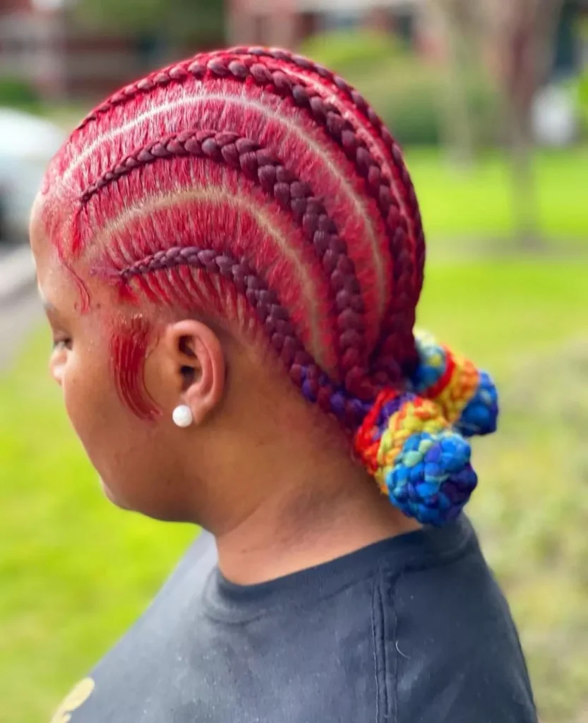 Red stitch cornrows in a bum