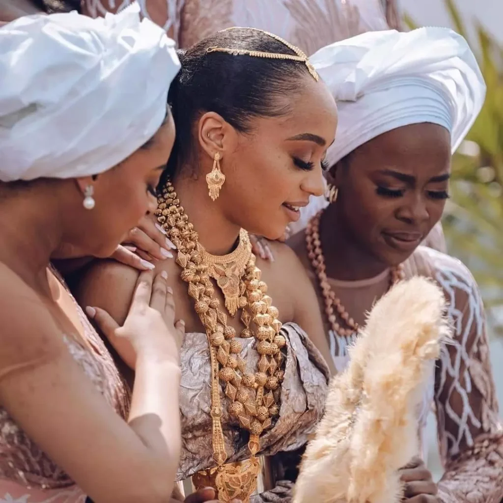 Ijaw bride adorned in coral and ivory beads