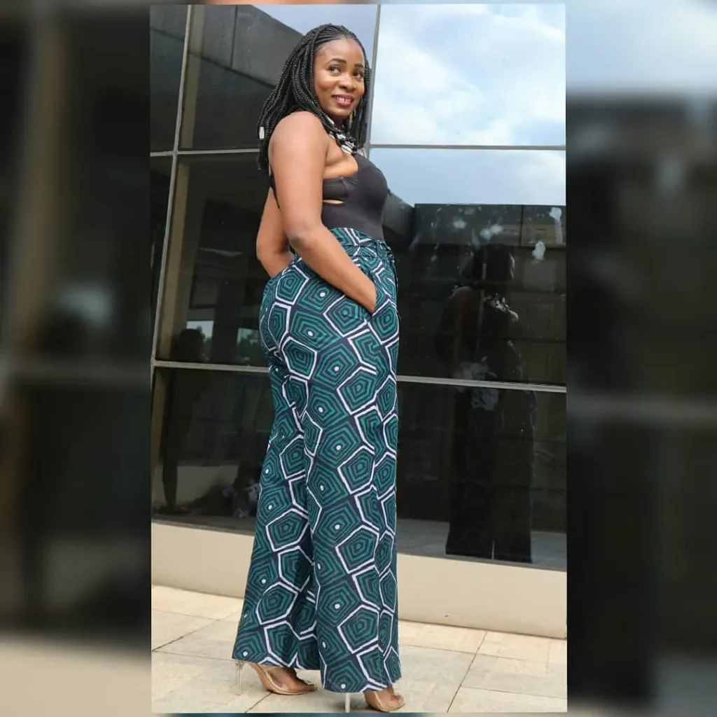palazzo ankara trousers Palazzo jumpsuit; illusion halter strap neckline; hidden pockets on the sides; invisible zip at the centre back; detachable belt.