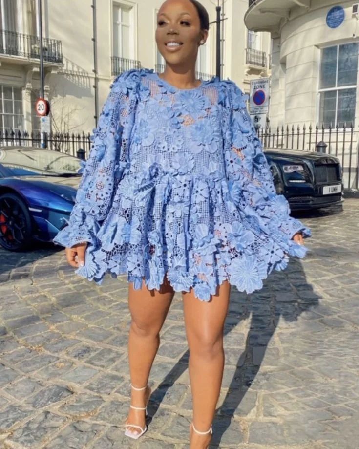 form-fitting mini dress with sultry lace-up sides