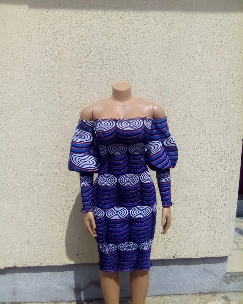 
Ankara Smocked Dress With Flared Sleeves 