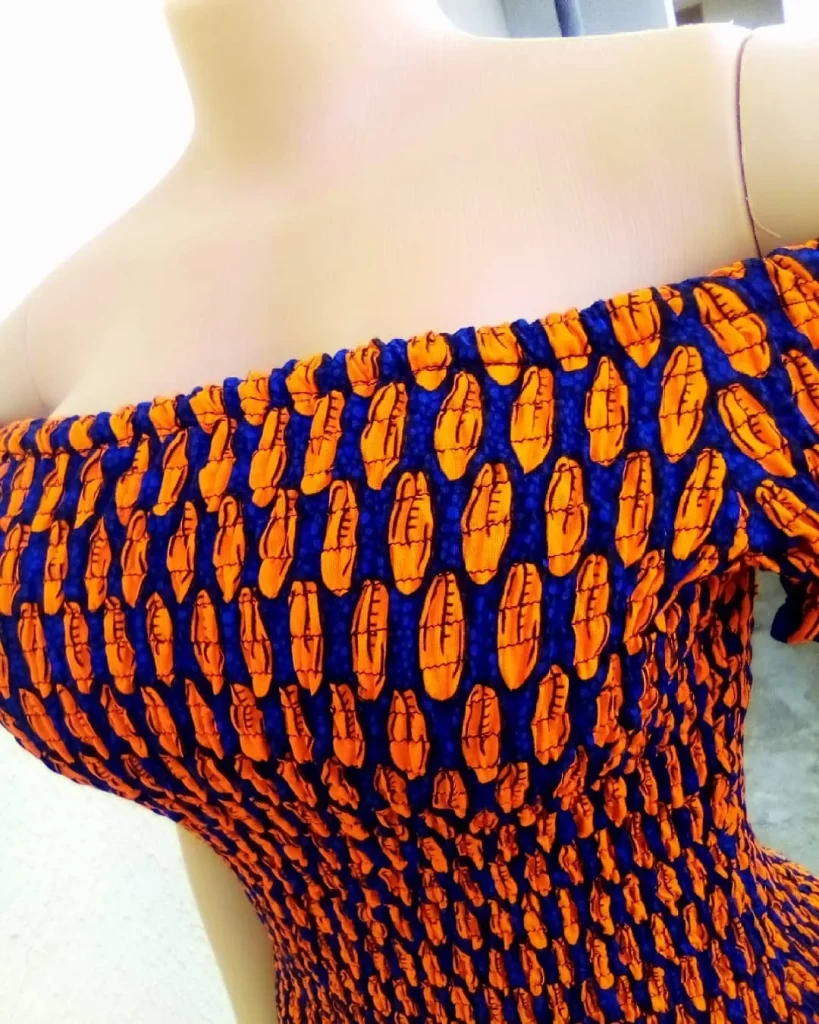
Ankara Smocked Dress with Flower 
