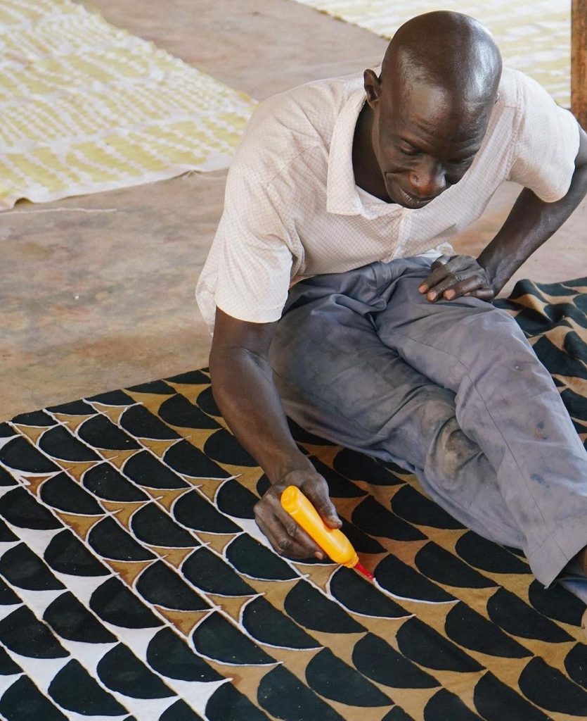Heavy fabric looks like Mud Cloth Style with Gold elegant embroidery 