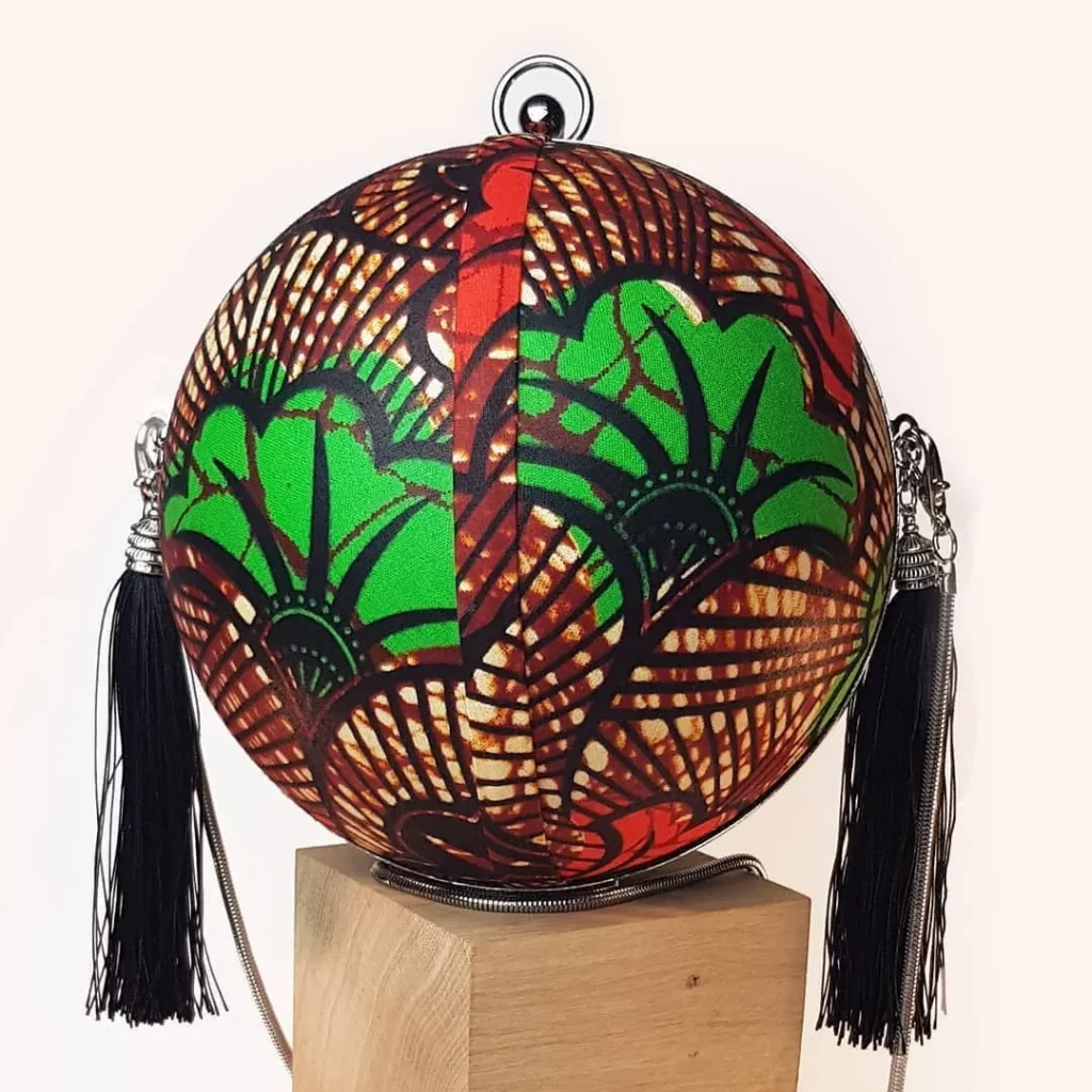 handmade bag made of leather and ankara fabric to give it class and a touch of African style
