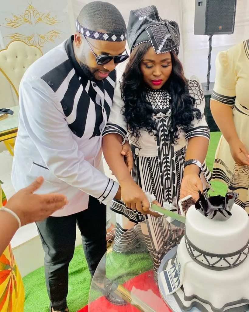 Black Xhosa Wedding Dress with Matching attire for man.