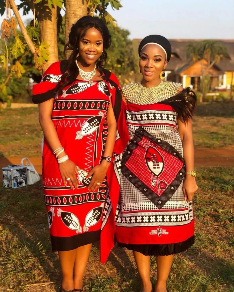 Women in traditional clothing during dance performance, Swazi cultural village, Lobamba,
