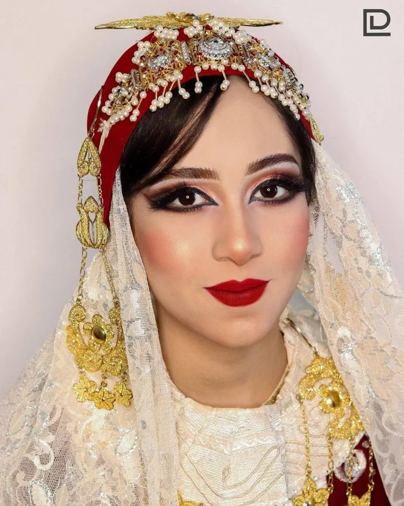 Libyan brides in traditional marriage outfits during a group wedding