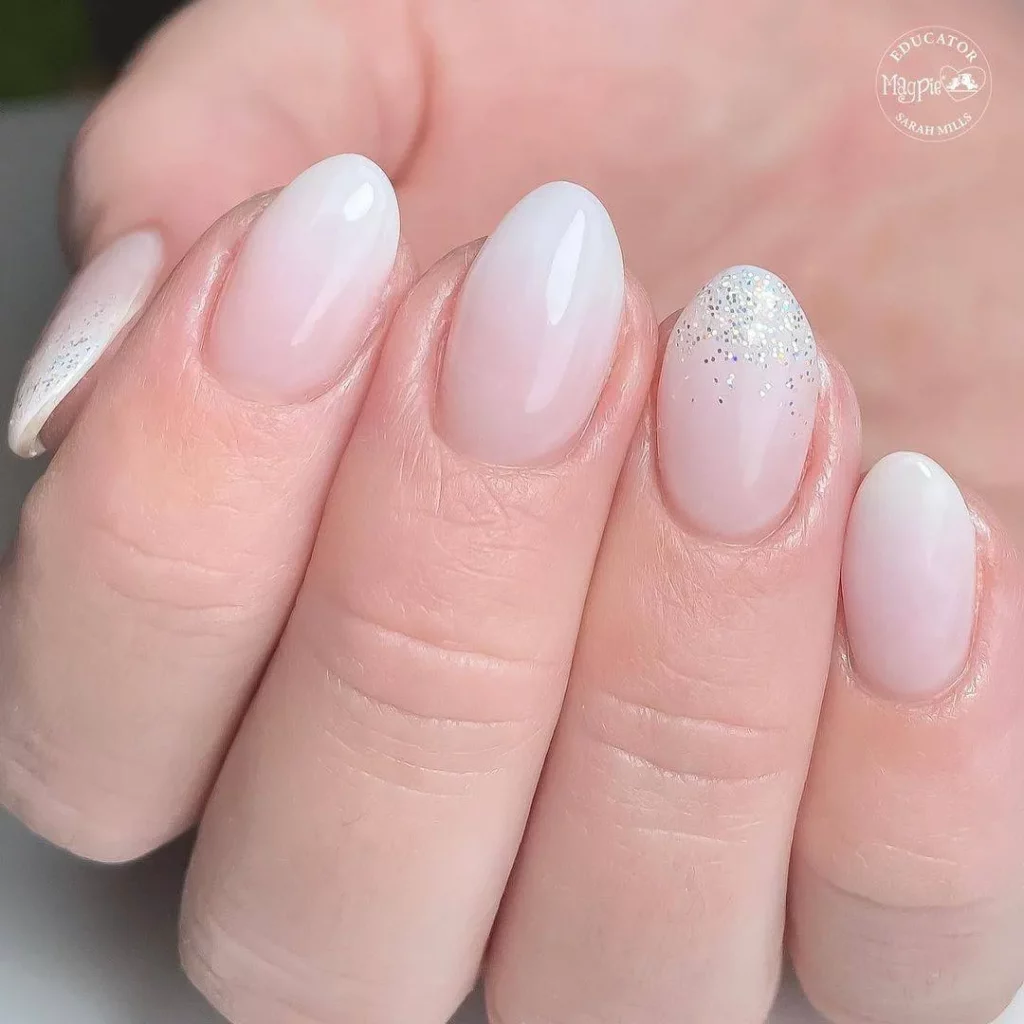 ombre nail design with holographic glitter