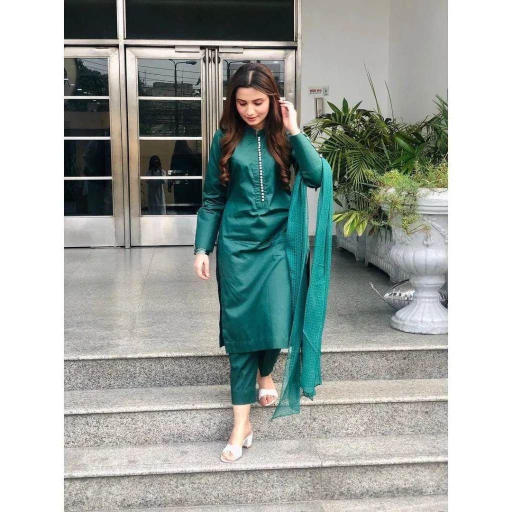 Green and white wedding attire