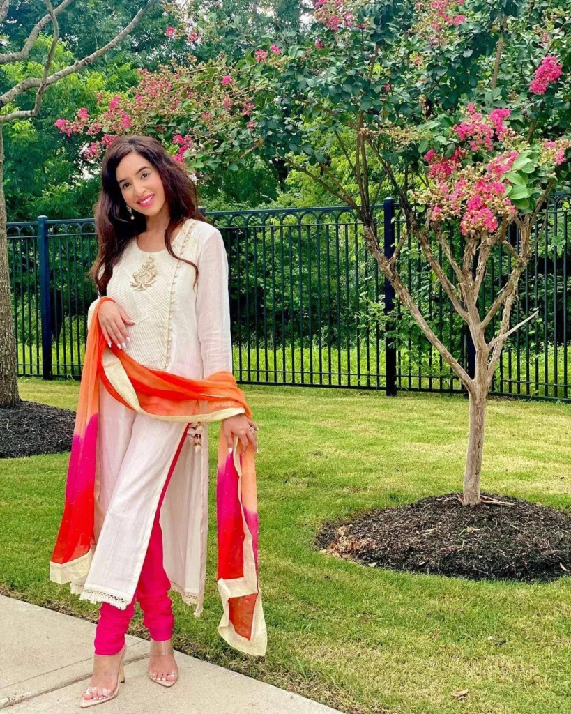 Which kind of outfit is churidar?