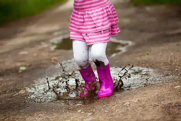Pink striped dress and fuchsia boots